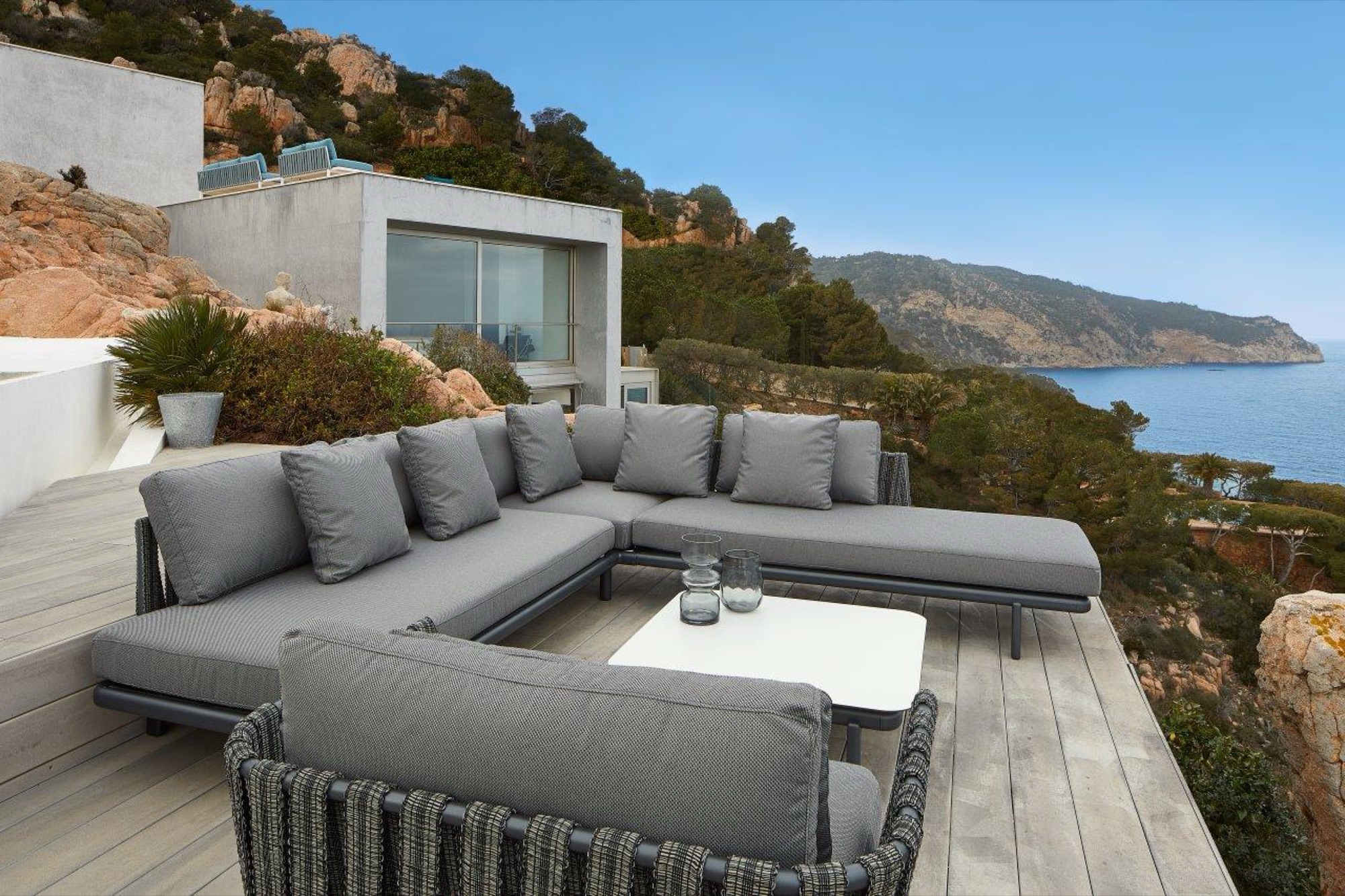 Resol Anthea modular corner lounge sofa on a seafront terrace