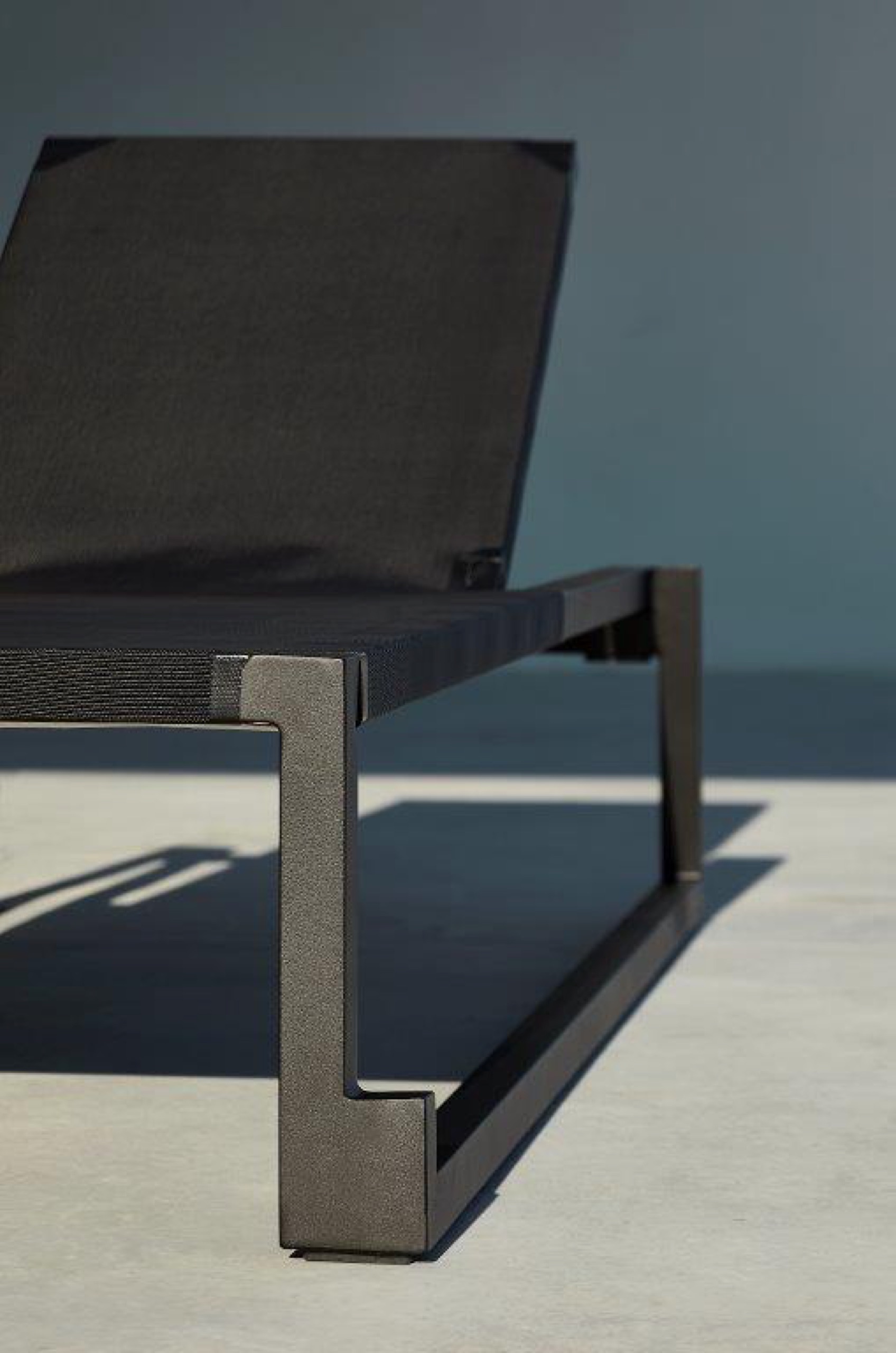 Close-up of a replaceable sling and aluminium frame on a Resol contract sun lounger